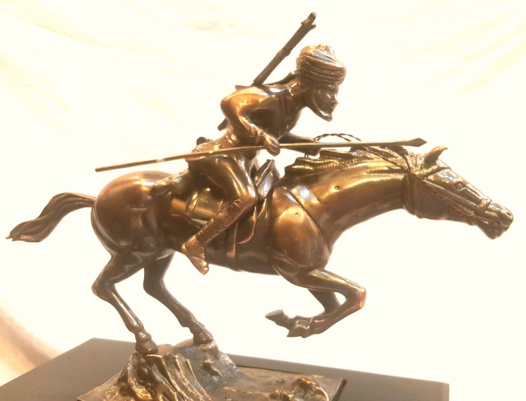 Metal horse rider statue 